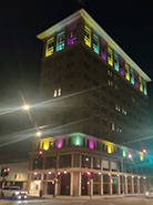 Fulton Office  with yellow, turquoise, and purple lights