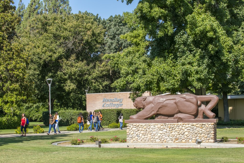 students walking by Reedley College tiger