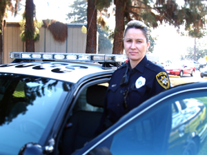 SCCCD policewoman standing by squad car