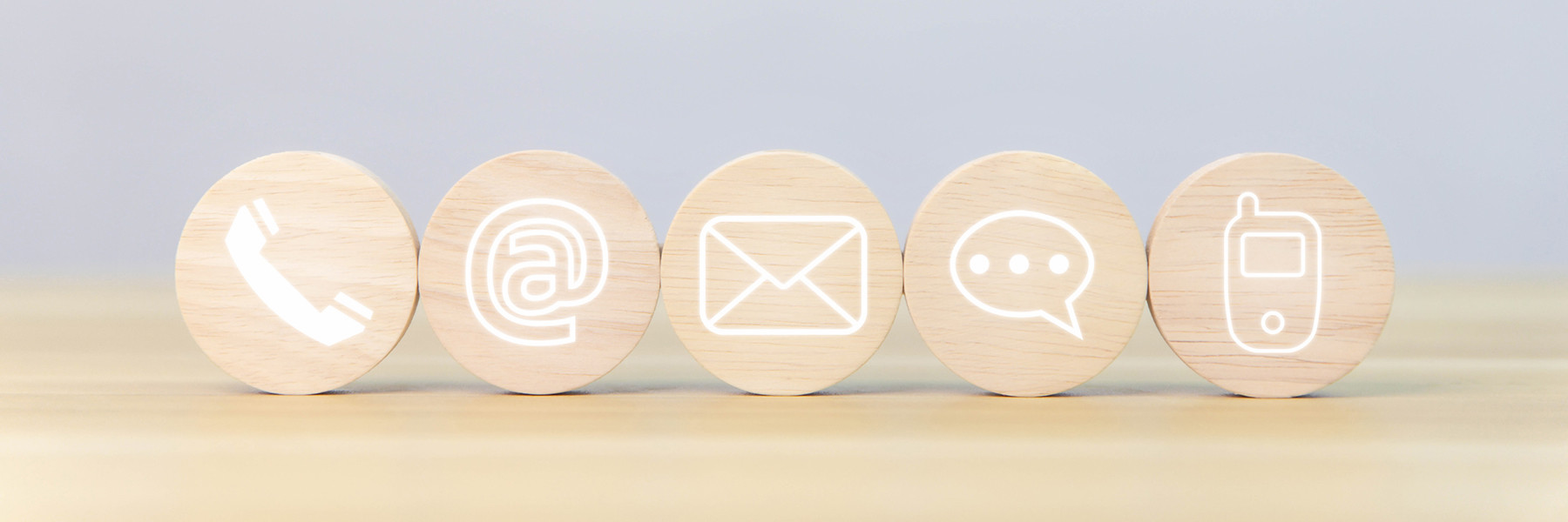 contact symbols engraved on wood blocks