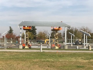 Installing solar panels at Madera Community College Center